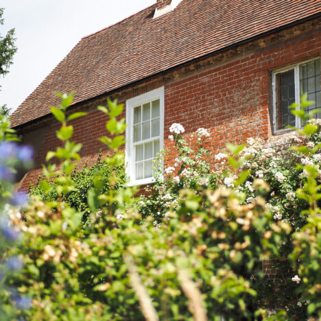 flowers in front of the jane austen house in chawton