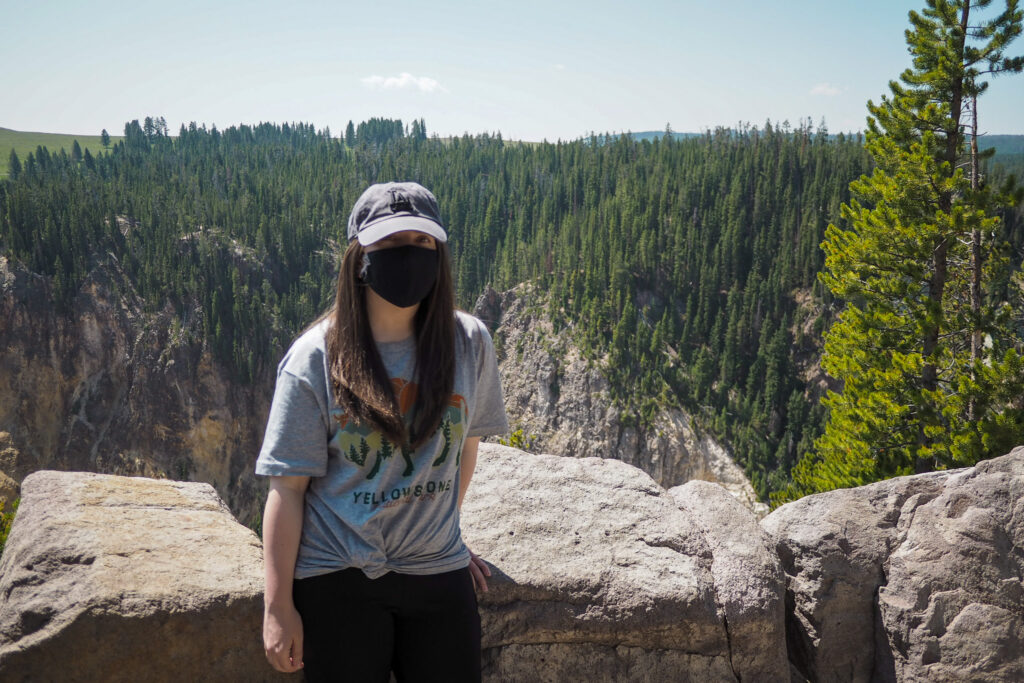 Author in front of Grand Canyon of the Yellowstone in Yellowstone National Park