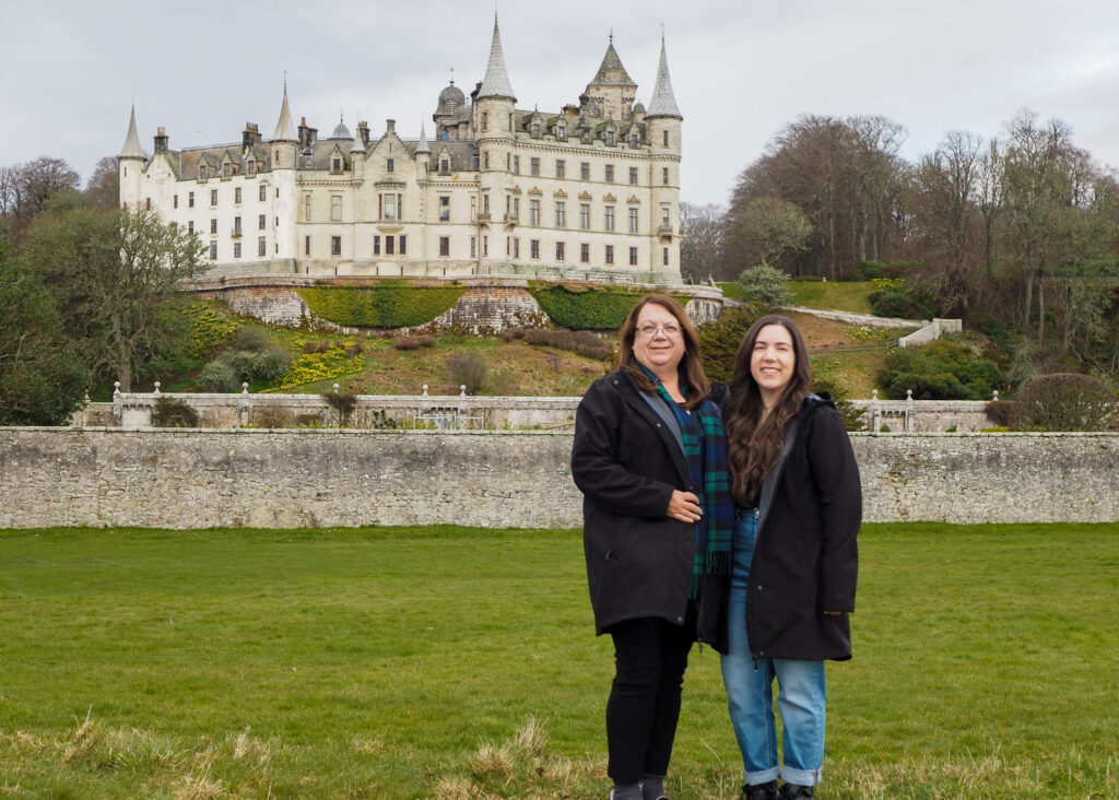 Author and her mom in front of Dunrobin Castle near Inverness, Scotland