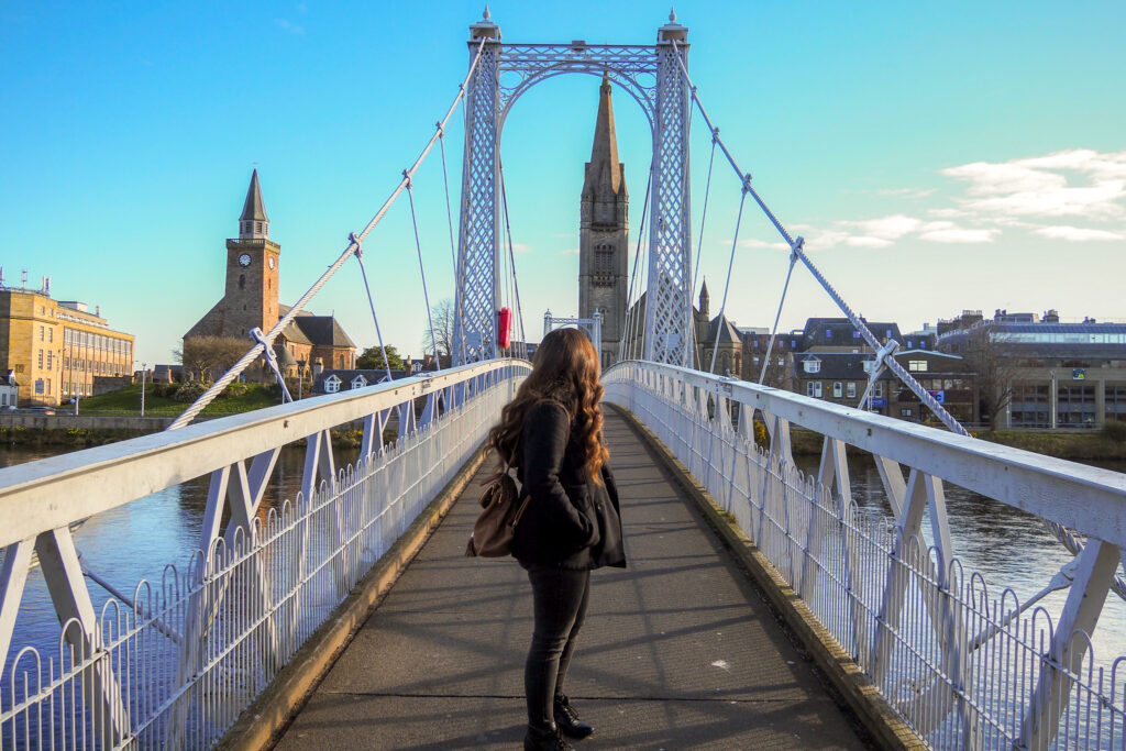author on the Grieg Street Bridge in Inverness, Scotland