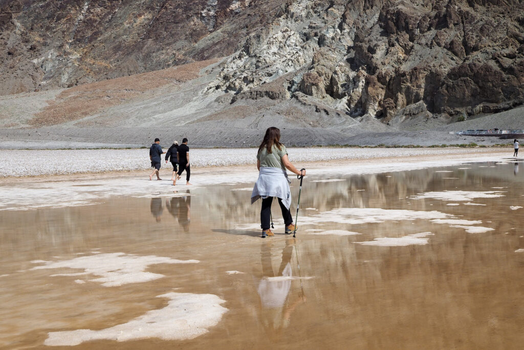 the author's mom walking back to the boardwalk at Badwater Basin