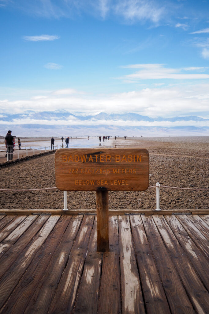 sign at Badwater Basin that says "Badwater Basin: 282 feet / 855 meters Below Sea Level"