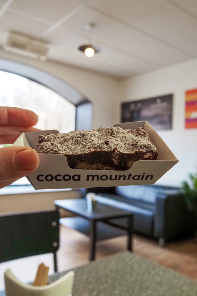 holding up the rocky road bar in cocoa mountain in dornoch