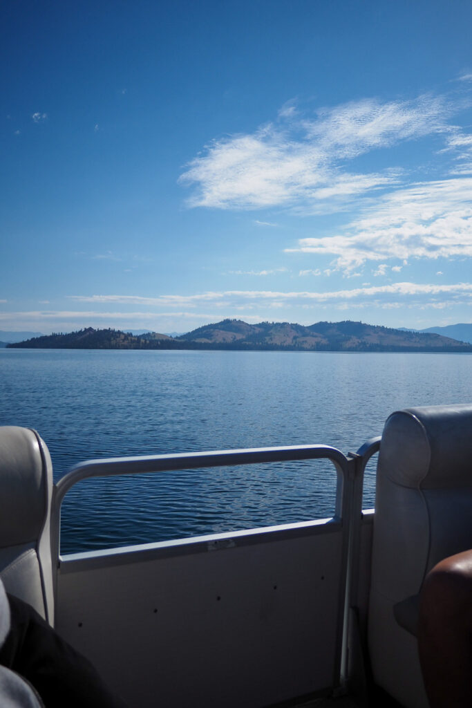 view of island from the boat in the lake heading to Wild Horse Island Montana