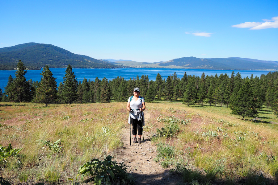 author's mom hiking on a trail in Wild Horse Island Montana