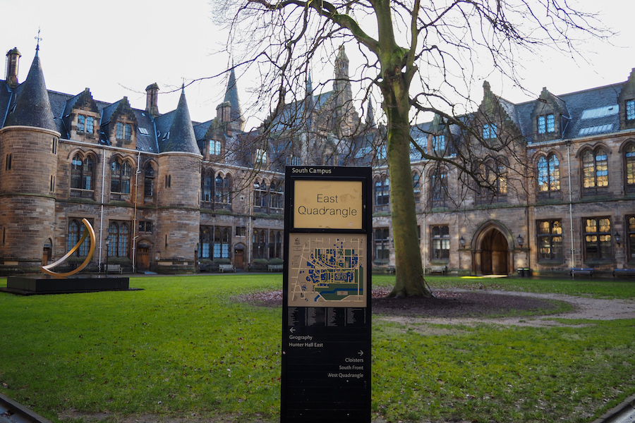 sign that says "East Quadrangle" in the University of Glasgow