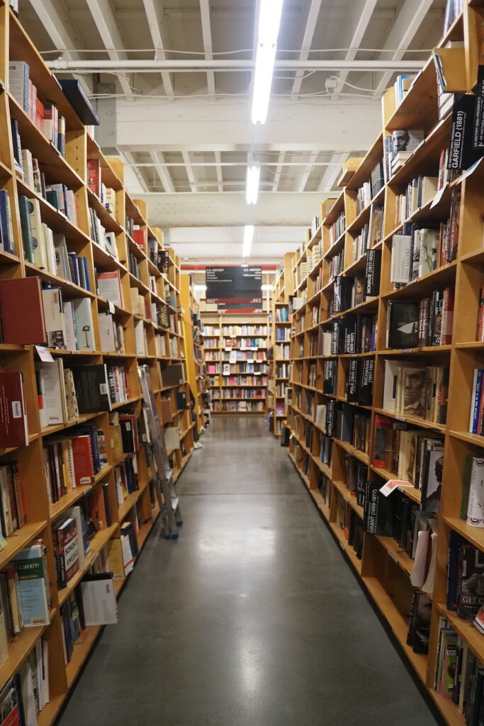 a row of bookshelves in Powell's City of Books in Portland Oregon