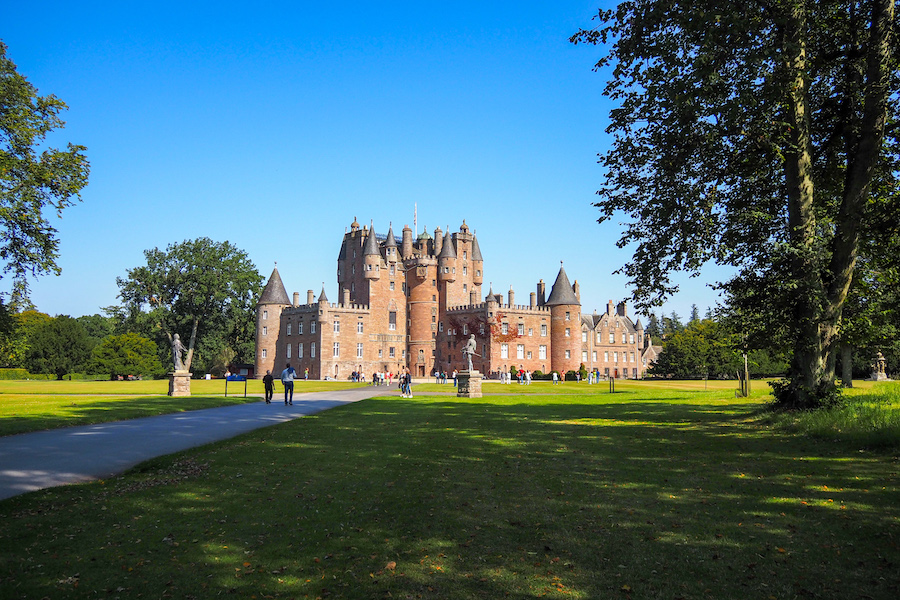 front of glamis castle by a tree