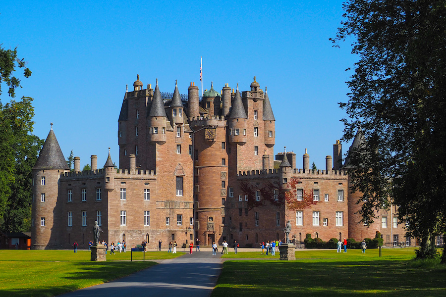 front of Glamis Castle by tree