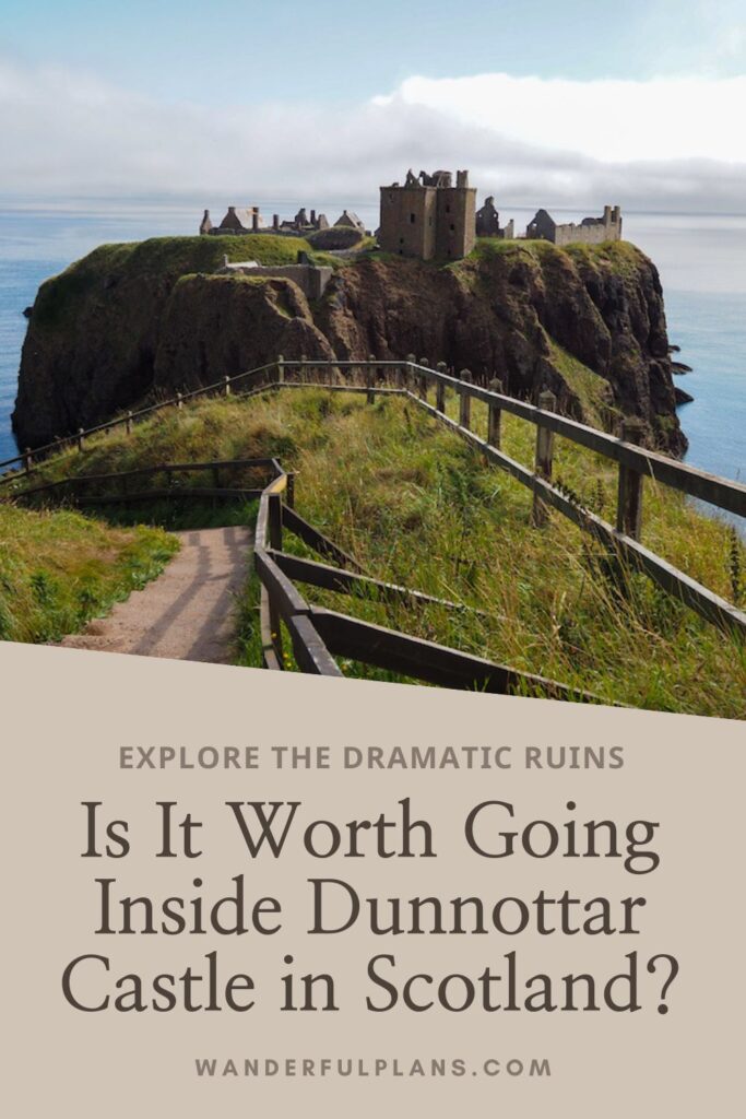 A dramatic stone castle ruin sits atop a steep, grassy cliff overlooking the sea, with a winding path leading up to it. Text overlay asks, Is it worth going inside Dunnottar Castle in Scotland?.